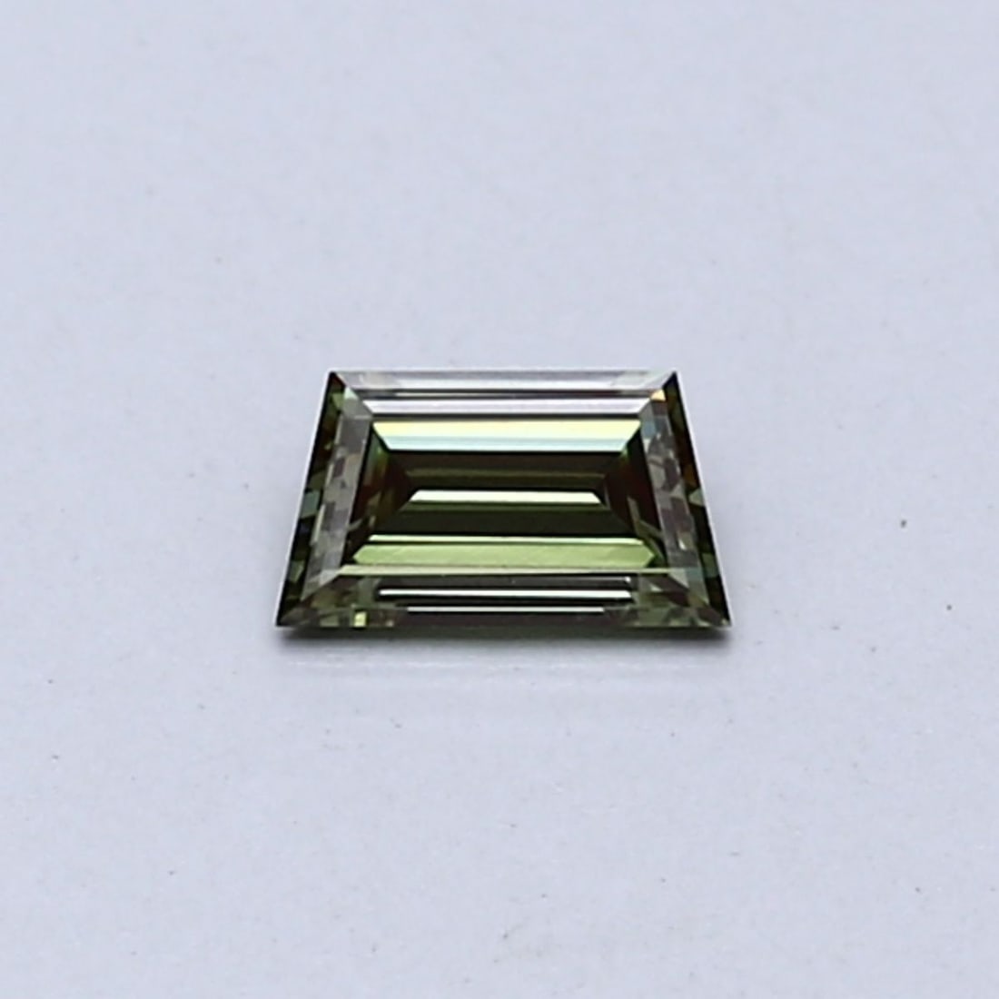 Loose Diamond - TRAPEZOID 0.19ct Fancy Vivid Green VS1: Loose Diamond - TRAPEZOID 0.19ct Fancy Vivid Green VS1 Source: This is a real non-mined Diamond that has been grown in a lab Shape: TRAPEZOID Carats: 0.19 Color: Fancy Vivid Green Certification: NONE 