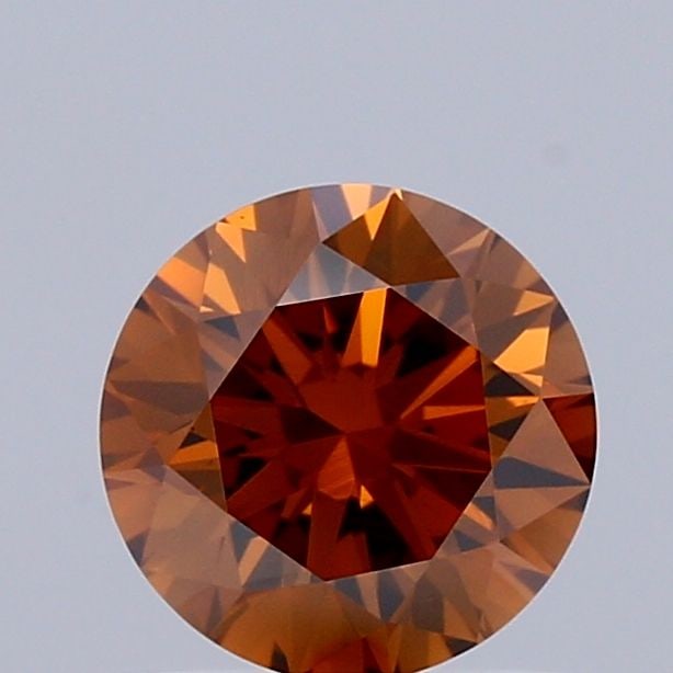 Ideal Loose Diamond - ROUND 0.71ct Fancy Deep Orange VS1: Ideal Loose Diamond - ROUND 0.71ct Fancy Deep Orange VS1 Source: This is a real non-mined Diamond that has been grown in a lab Shape: ROUND Carats: 0.71 Color: Fancy Deep Orange Certification: IGI Vid