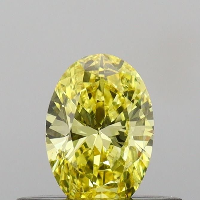 Loose Diamond - OVAL 0.36ct Fancy Vivid Yellow VS2: Loose Diamond - OVAL 0.36ct Fancy Vivid Yellow VS2 Source: This is a real non-mined Diamond that has been grown in a lab Shape: OVAL Carats: 0.36 Color: Fancy Vivid Yellow Certification: IGI Video: