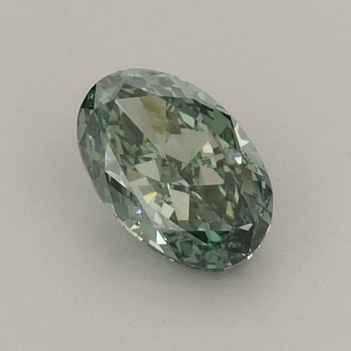 Loose Diamond - OVAL 0.59ct Fancy Vivid Green VVS2: Loose Diamond - OVAL 0.59ct Fancy Vivid Green VVS2 Source: This is a real non-mined Diamond that has been grown in a lab Shape: OVAL Carats: 0.59 Color: Fancy Vivid Green Certification: IGI Video:
