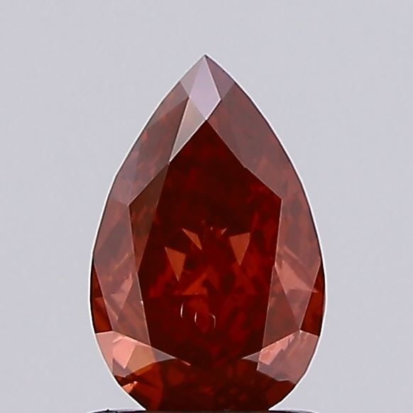 Loose Diamond - PEAR 0.73ct Fancy Vivid Red VS2: Loose Diamond - PEAR 0.73ct Fancy Vivid Red VS2 Source: This is a real non-mined Diamond that has been grown in a lab Shape: PEAR Carats: 0.73 Color: Fancy Vivid Red Certification: NONE Video: