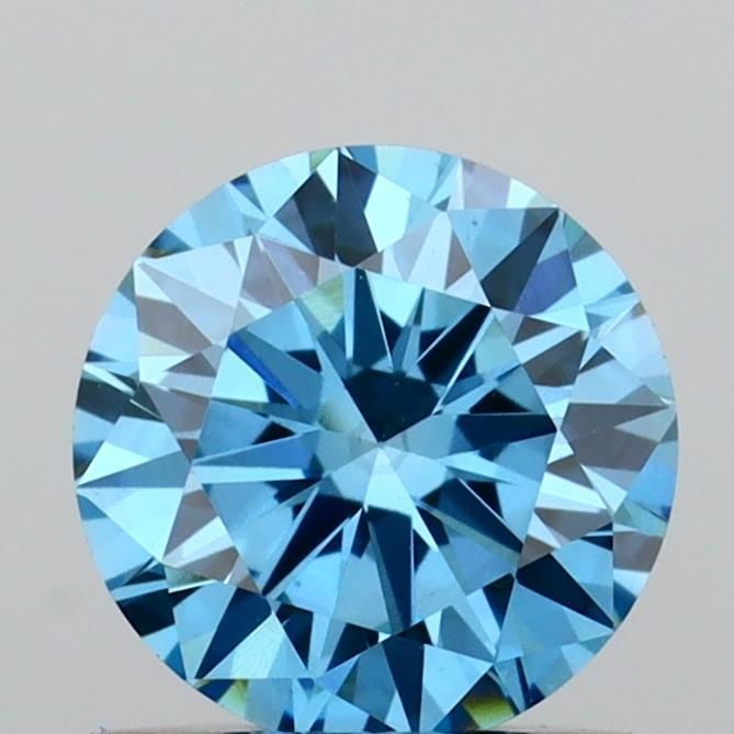 Loose Diamond - ROUND 0.75ct Fancy Vivid Blue VS1: Loose Diamond - ROUND 0.75ct Fancy Vivid Blue VS1 Source: This is a real non-mined Diamond that has been grown in a lab Shape: ROUND Carats: 0.75 Color: Fancy Vivid Blue Certification: IGI Video: