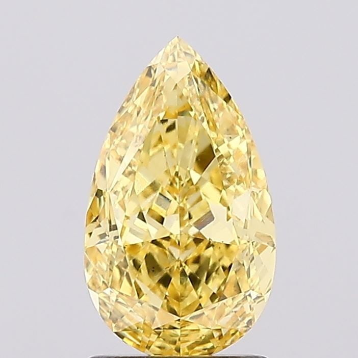 Loose Diamond - PEAR 1.64ct Fancy Vivid Yellow VS1: Loose Diamond - PEAR 1.64ct Fancy Vivid Yellow VS1 Source: This is a real non-mined Diamond that has been grown in a lab Shape: PEAR Carats: 1.64 Color: Fancy Vivid Yellow Certification: IGI Video: