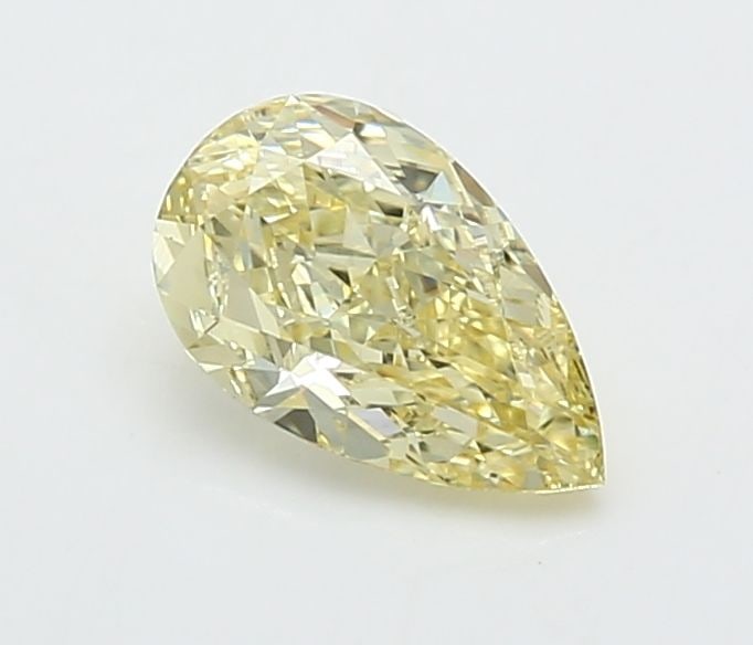 Loose Diamond - PEAR 0.94ct Fancy Yellow VS1: Loose Diamond - PEAR 0.94ct Fancy Yellow VS1 Source: This is a real non-mined Diamond that has been grown in a lab Shape: PEAR Carats: 0.94 Color: Fancy Yellow Certification: IGI Video: