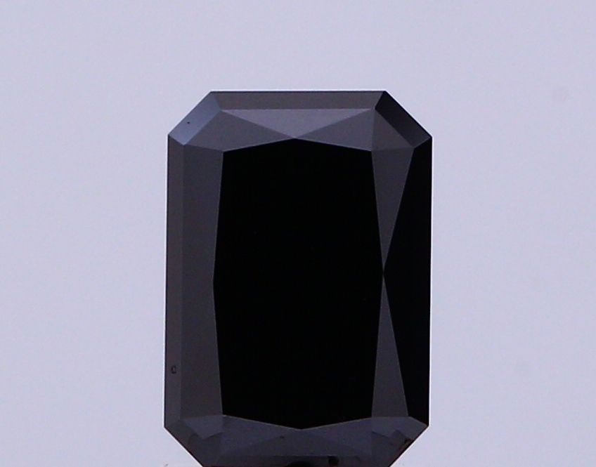 Loose Diamond - RADIANT 2.05ct Fancy Vivid Black VS1: Loose Diamond - RADIANT 2.05ct Fancy Vivid Black VS1 Source: This is a real non-mined Diamond that has been grown in a lab Shape: RADIANT Carats: 2.05 Color: Fancy Vivid Black Certification: NONE Vide