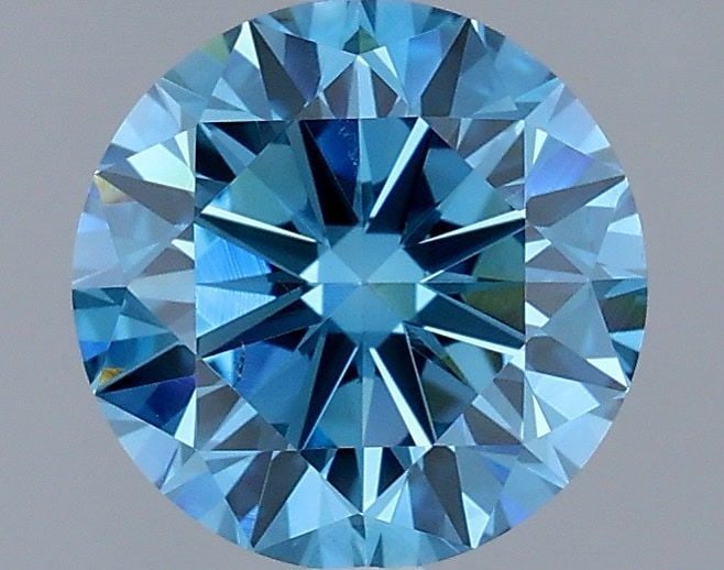 Loose Diamond - ROUND 1.71ct Fancy Vivid Blue VS2: Loose Diamond - ROUND 1.71ct Fancy Vivid Blue VS2 Source: This is a real non-mined Diamond that has been grown in a lab Shape: ROUND Carats: 1.71 Color: Fancy Vivid Blue Certification: IGI Video: