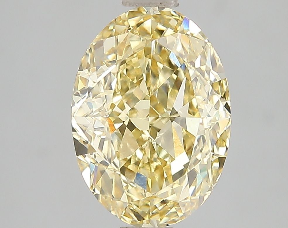 Loose Diamond - OVAL 3.09ct Fancy Vivid Yellow VS1: Loose Diamond - OVAL 3.09ct Fancy Vivid Yellow VS1 Source: This is a real non-mined Diamond that has been grown in a lab Shape: OVAL Carats: 3.09 Color: Fancy Vivid Yellow Certification: IGI Video: