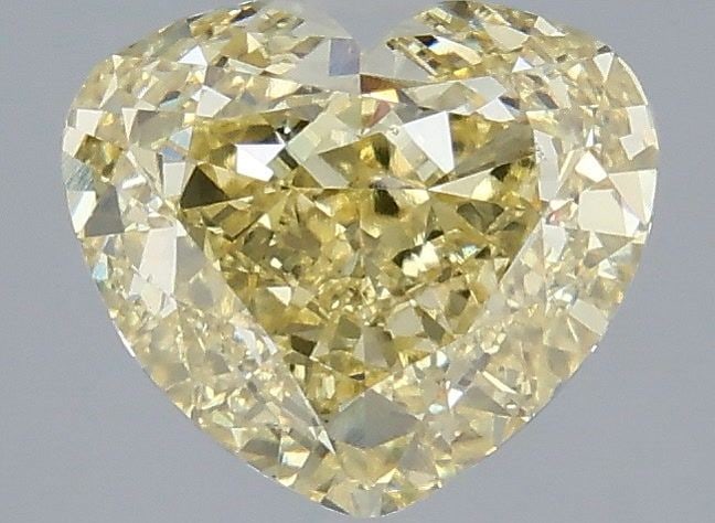 Loose Diamond - HEART 3.04ct Fancy Intense Yellow VVS2: Loose Diamond - HEART 3.04ct Fancy Intense Yellow VVS2 Source: This is a real non-mined Diamond that has been grown in a lab Shape: HEART Carats: 3.04 Color: Fancy Intense Yellow Certification: IGI Vi