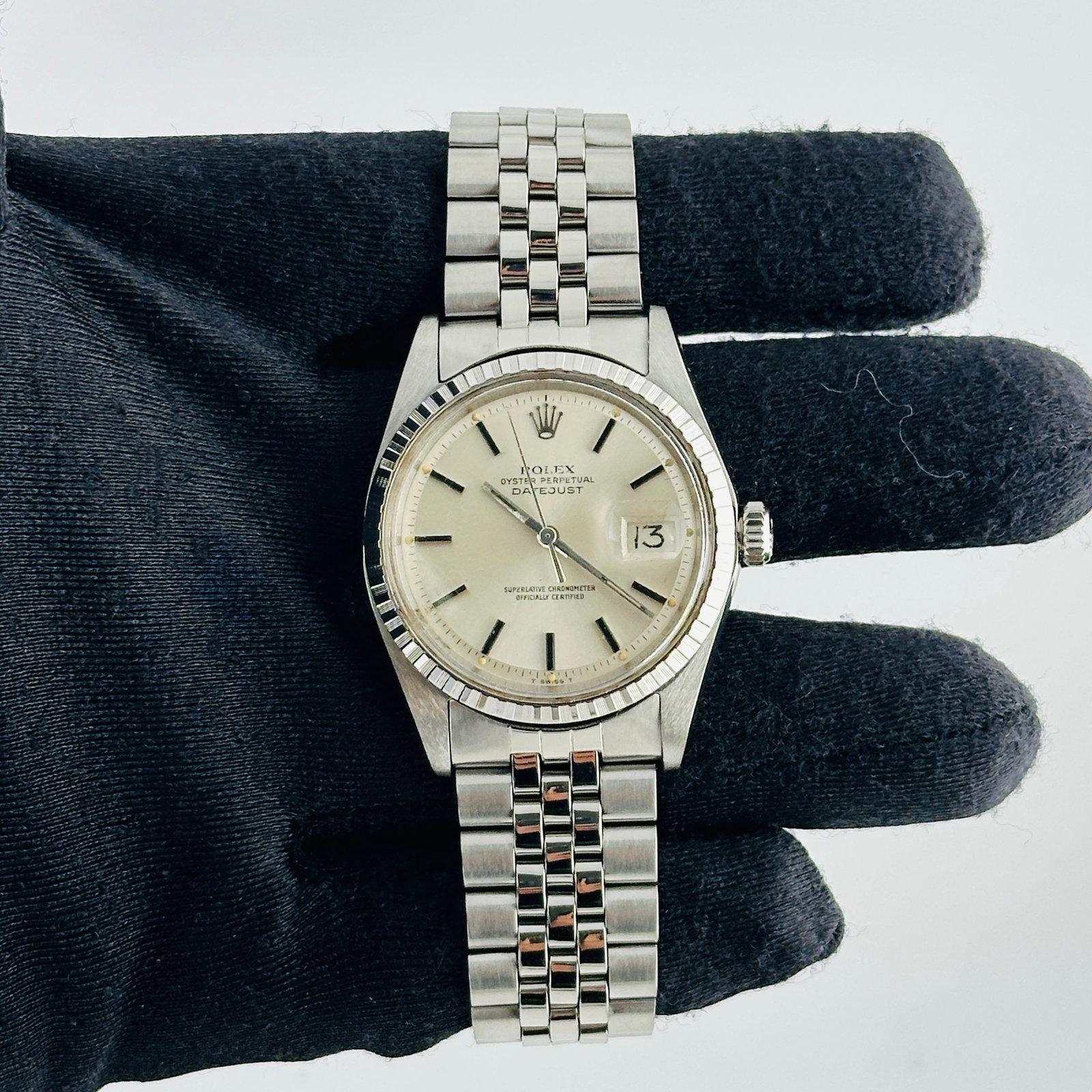 Rolex Datejust Ref 1601 Silver Stick Dial Jubilee Bracelet: Rolex Datejust Ref 1601 Silver Stick Dial Jubilee Bracelet This Rolex Datejust features a silver stick dial, fluted bezel, and is paired with a folded Jubilee bracelet. The watch is identified by refe