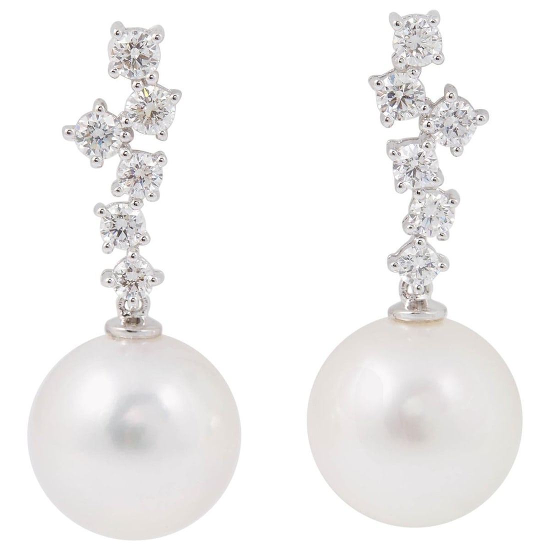 Harbor Diamonds 18k White Gold South Sea Pearl Diamond Earrings: Harbor Diamonds 18k White Gold South Sea Pearl Diamond Earrings These elegant dangle drop earrings feature lustrous 13-14 mm South Sea pearls complemented by sparkling diamonds. Crafted from 18k white
