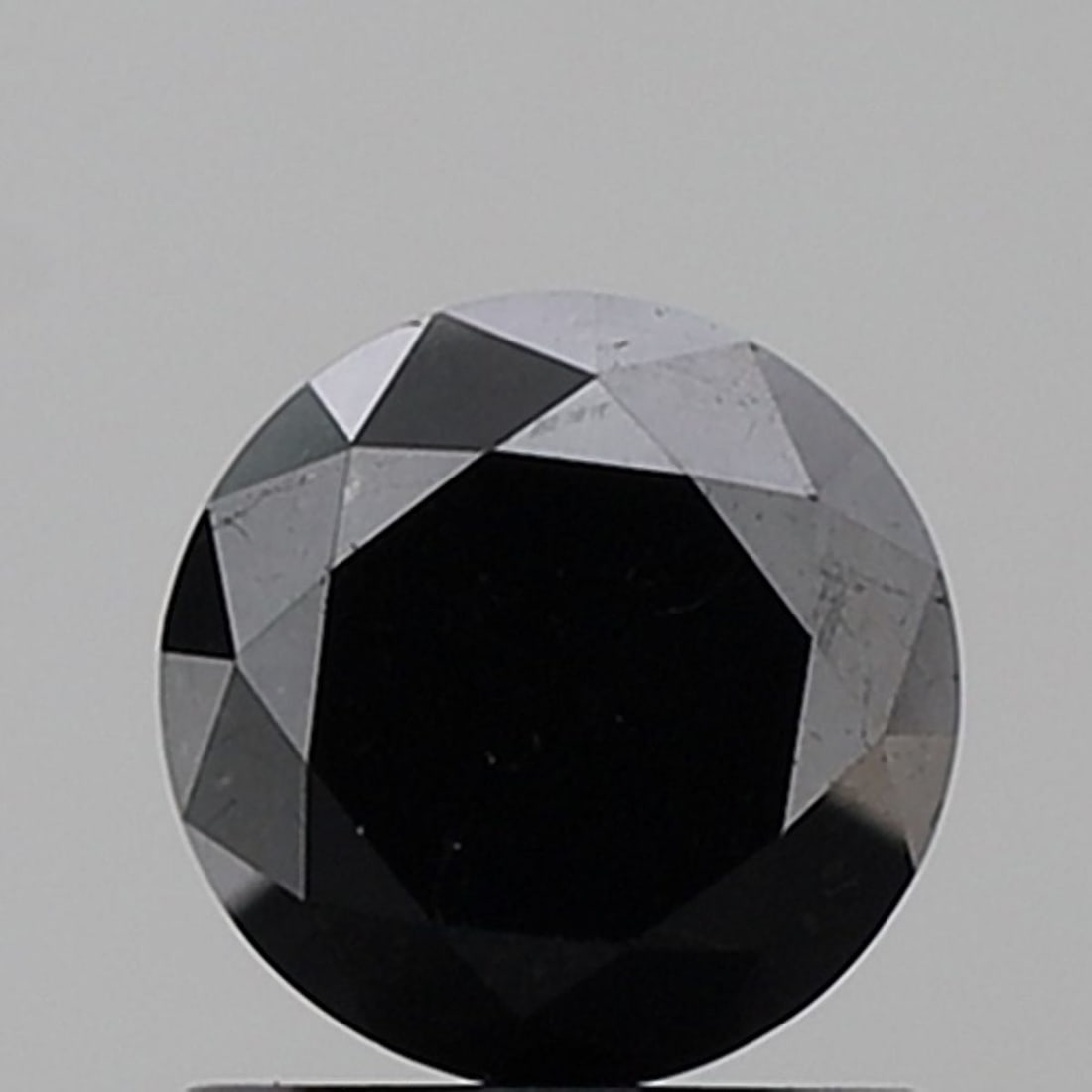 Loose Diamond - ROUND 1.26ct Fancy Black VS1: Loose Diamond - ROUND 1.26ct Fancy Black VS1 Source: Natural Shape: ROUND Carats: 1.26 Color: Fancy Black Certification: NONE Video:
