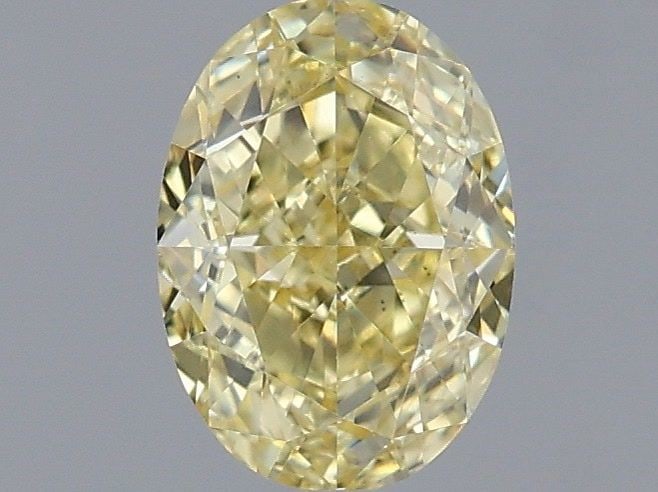 Loose Diamond - OVAL 1.13ct Fancy Yellow VS1: Loose Diamond - OVAL 1.13ct Fancy Yellow VS1 Source: This is a real non-mined Diamond that has been grown in a lab Shape: OVAL Carats: 1.13 Color: Fancy Yellow Certification: IGI Video: