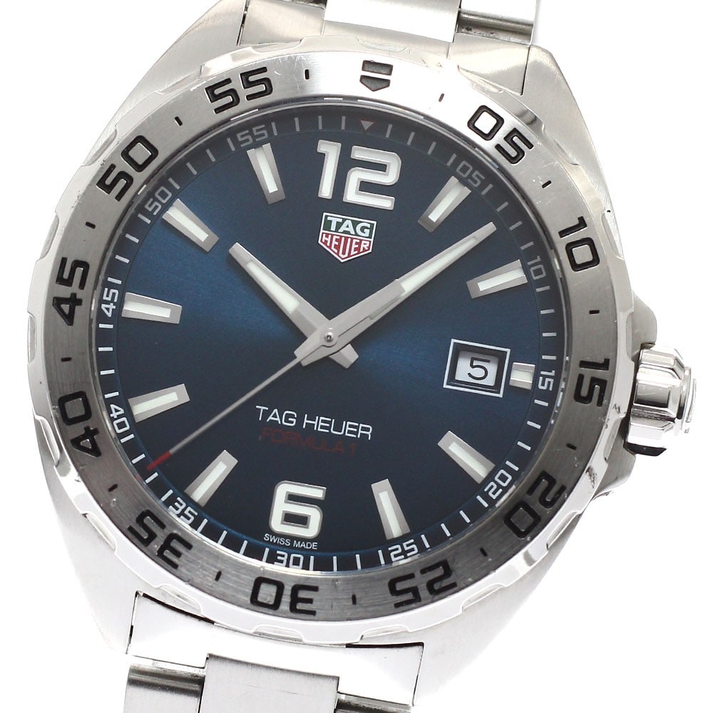 TAG Heuer Formula 1 WAZ1118 Blue Dial Quartz Date Watch: TAG Heuer Formula 1 WAZ1118 Blue Dial Quartz Date Watch This TAG Heuer Formula 1 Date Quartz men's wristwatch features a blue dial and is crafted from stainless steel, including both the case and brac