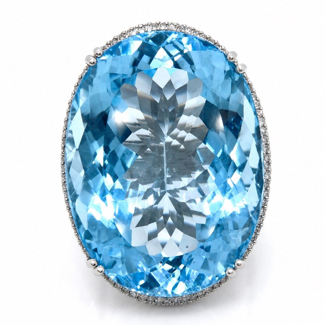 Blue Topaz and Diamond Ring in 14K White Gold 140 Carat: Blue Topaz and Diamond Ring in 14K White Gold 140 Carat This 14K white gold ring features an impressive approximately 140.00 carat blue topaz as the centerpiece, accented by approximately 1.40 carats 
