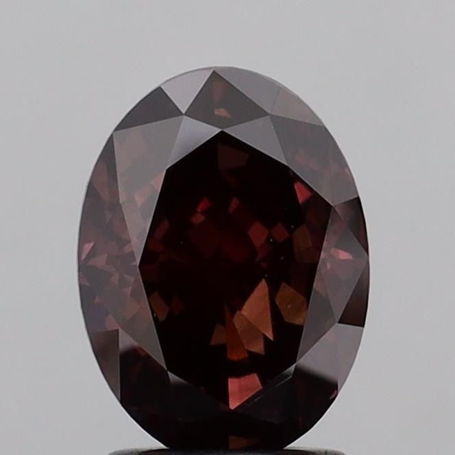 Loose Diamond - OVAL 2.19ct Fancy Deep Brown Pink VS2: Loose Diamond - OVAL 2.19ct Fancy Deep Brown Pink VS2 Source: This is a real non-mined Diamond that has been grown in a lab Shape: OVAL Carats: 2.19 Color: Fancy Deep Brown Pink Certification: IGI Vid