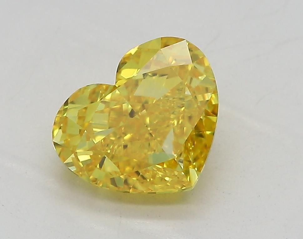Loose Diamond - HEART 1.43ct Fancy Vivid Yellow VVS1: Loose Diamond - HEART 1.43ct Fancy Vivid Yellow VVS1 Source: This is a real non-mined Diamond that has been grown in a lab Shape: HEART Carats: 1.43 Color: Fancy Vivid Yellow Certification: IGI Video: