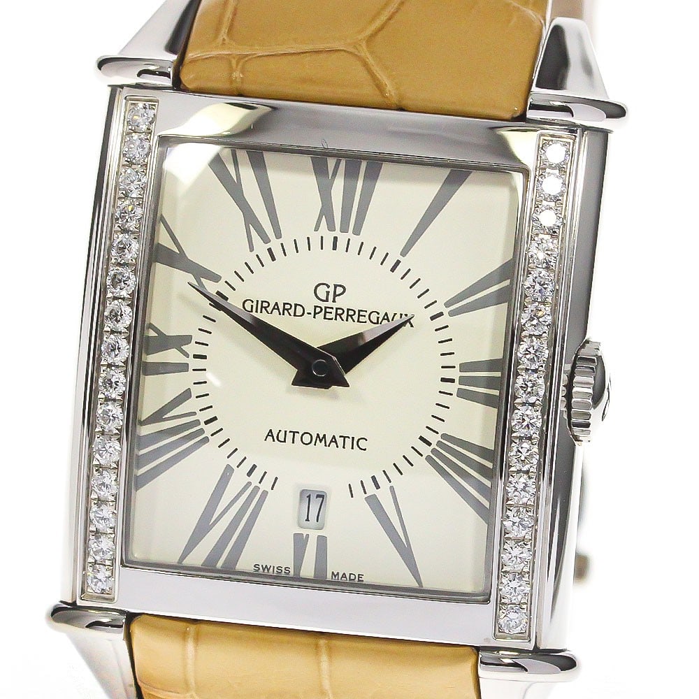 Girard Perregaux Vintage 1945 ladies automatic date watch 25860: Girard Perregaux Vintage 1945 ladies automatic date watch 25860 This Girard Perregaux Vintage 1945 150th Anniversary women's wristwatch features a stainless steel case and a white dial, complemented b