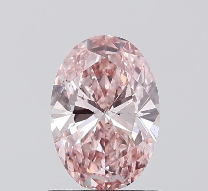 Loose Diamond - OVAL 1.02ct Fancy Intense Pink SI1: Loose Diamond - OVAL 1.02ct Fancy Intense Pink SI1 Source: This is a real non-mined Diamond that has been grown in a lab Shape: OVAL Carats: 1.02 Color: Fancy Intense Pink Certification: IGI Video: