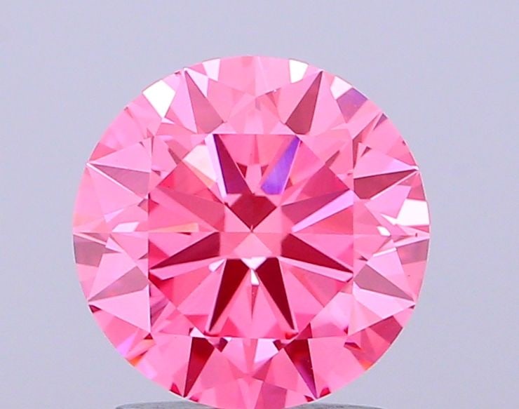 Loose Diamond - ROUND 2.01ct Fancy Vivid Pink VVS2: Loose Diamond - ROUND 2.01ct Fancy Vivid Pink VVS2 Source: This is a real non-mined Diamond that has been grown in a lab Shape: ROUND Carats: 2.01 Color: Fancy Vivid Pink Certification: IGI Video: