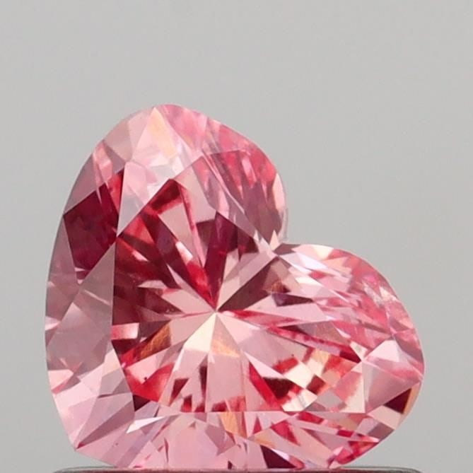 Loose Diamond - HEART 0.64ct Fancy Vivid Pink VS1: Loose Diamond - HEART 0.64ct Fancy Vivid Pink VS1 Source: This is a real non-mined Diamond that has been grown in a lab Shape: HEART Carats: 0.64 Color: Fancy Vivid Pink Certification: IGI Video: