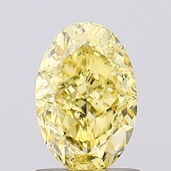 Loose Diamond - OVAL 1.11ct Fancy Vivid Yellow SI1: Loose Diamond - OVAL 1.11ct Fancy Vivid Yellow SI1 Source: This is a real non-mined Diamond that has been grown in a lab Shape: OVAL Carats: 1.11 Color: Fancy Vivid Yellow Certification: IGI Video: