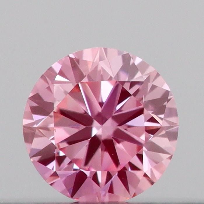 Loose Diamond - ROUND 0.11ct Fancy Vivid Pink VS1: Loose Diamond - ROUND 0.11ct Fancy Vivid Pink VS1 Source: This is a real non-mined Diamond that has been grown in a lab Shape: ROUND Carats: 0.11 Color: Fancy Vivid Pink Certification: IGI Video: