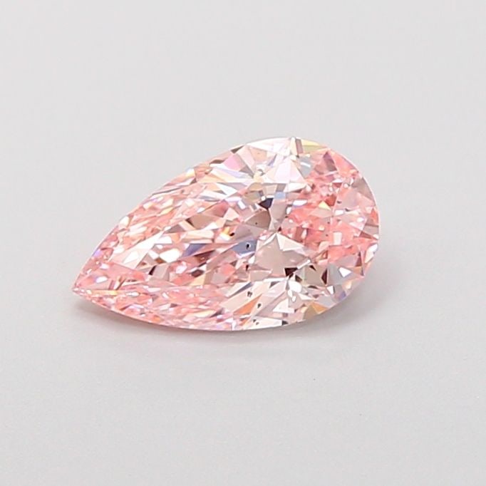 Loose Diamond - PEAR 1.04ct Fancy Vivid Pink SI1: Loose Diamond - PEAR 1.04ct Fancy Vivid Pink SI1 Source: This is a real non-mined Diamond that has been grown in a lab Shape: PEAR Carats: 1.04 Color: Fancy Vivid Pink Certification: IGI Video: