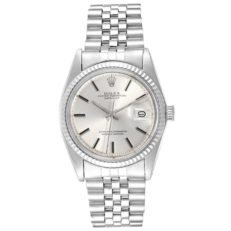 Rolex Datejust 1601 4 Silver Stick Dial Fluted Bezel Jubilee Bracelet: Rolex Datejust 1601 4 Silver Stick Dial Fluted Bezel Jubilee Bracelet This men's Rolex Datejust features a silver stick dial and a fluted bezel, paired with a folded Jubilee bracelet. The watch is ide