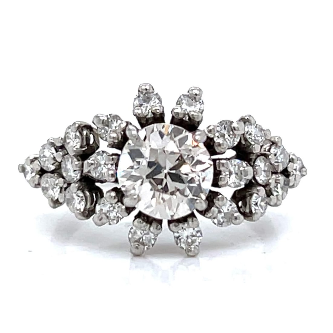 Art Deco Platinum Ring with 1.35 Ct European Diamond and 22 Accent Diamonds: Art Deco Platinum Ring with 1.35 Ct European Diamond and 22 Accent Diamonds Discover the elegance of this Art Deco Platinum Diamond Ring, featuring a stunning approximately 1.35 Ct. European-cut diamo