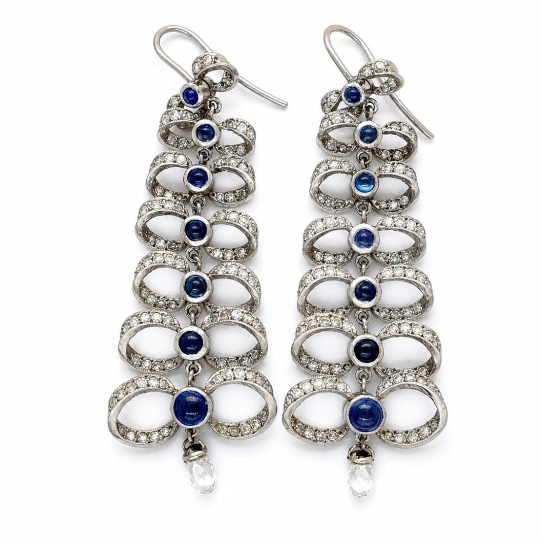 Art Deco Platinum White Gold Earrings with Sapphire and Diamond: Art Deco Platinum White Gold Earrings with Sapphire and Diamond These Art Deco earrings are crafted from platinum and 14K white gold, featuring a sophisticated combination of sapphires and diamonds. T