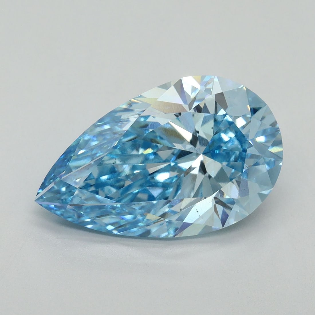 Loose Diamond - PEAR 5.01ct Fancy Vivid Blue VS2: Loose Diamond - PEAR 5.01ct Fancy Vivid Blue VS2 Source: This is a real non-mined Diamond that has been grown in a lab Shape: PEAR Carats: 5.01 Color: Fancy Vivid Blue Certification: IGI Video: