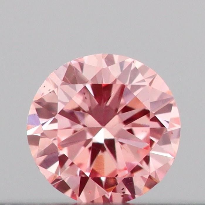 Loose Diamond - ROUND 0.09ct Fancy Intense Pink VS2: Loose Diamond - ROUND 0.09ct Fancy Intense Pink VS2 Source: This is a real non-mined Diamond that has been grown in a lab Shape: ROUND Carats: 0.09 Color: Fancy Intense Pink Certification: IGI Video: