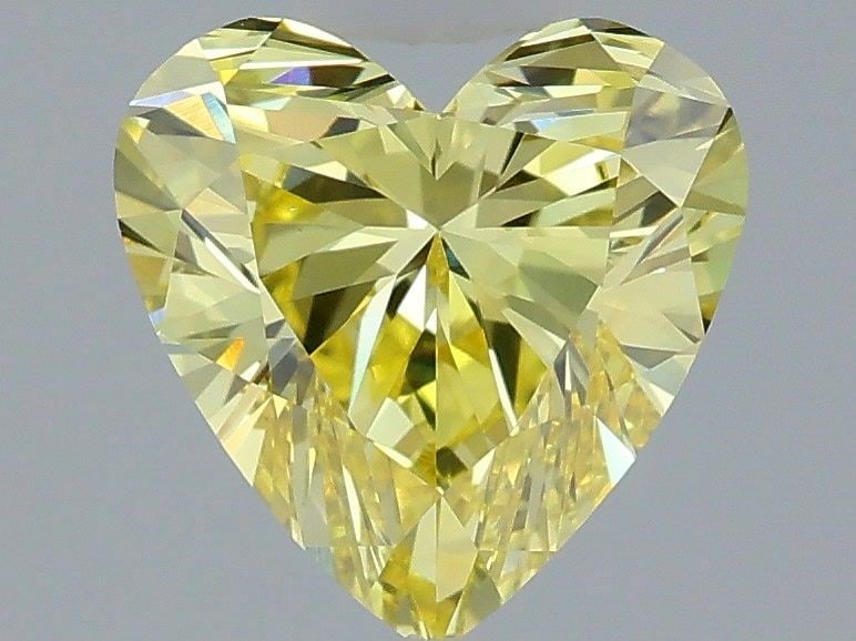 Loose Diamond - HEART 1.53ct Fancy Vivid Yellow VS1: Loose Diamond - HEART 1.53ct Fancy Vivid Yellow VS1 Source: This is a real non-mined Diamond that has been grown in a lab Shape: HEART Carats: 1.53 Color: Fancy Vivid Yellow Certification: IGI Video: