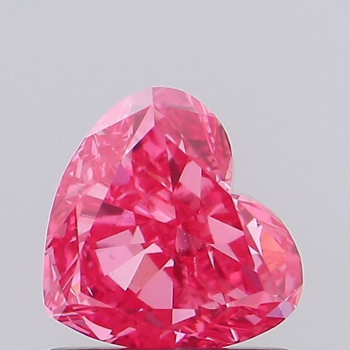 Loose Diamond - HEART 0.85ct Fancy Vivid Pink VS2: Loose Diamond - HEART 0.85ct Fancy Vivid Pink VS2 Source: This is a real non-mined Diamond that has been grown in a lab Shape: HEART Carats: 0.85 Color: Fancy Vivid Pink Certification: IGI Video:
