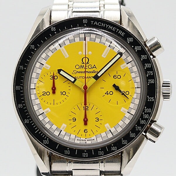 OMEGA Schumacher 3510.12 men s wristwatch: OMEGA Schumacher 3510.12 men s wristwatch This is an OMEGA Speedmaster Schumacher Model 3510.12 men's wristwatch from Switzerland. The watch is pre-owned and shows general signs of use, including dama