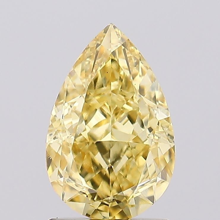 Loose Diamond - PEAR 1.58ct Fancy Intense Yellow VS1: Loose Diamond - PEAR 1.58ct Fancy Intense Yellow VS1 Source: This is a real non-mined Diamond that has been grown in a lab Shape: PEAR Carats: 1.58 Color: Fancy Intense Yellow Certification: IGI Video