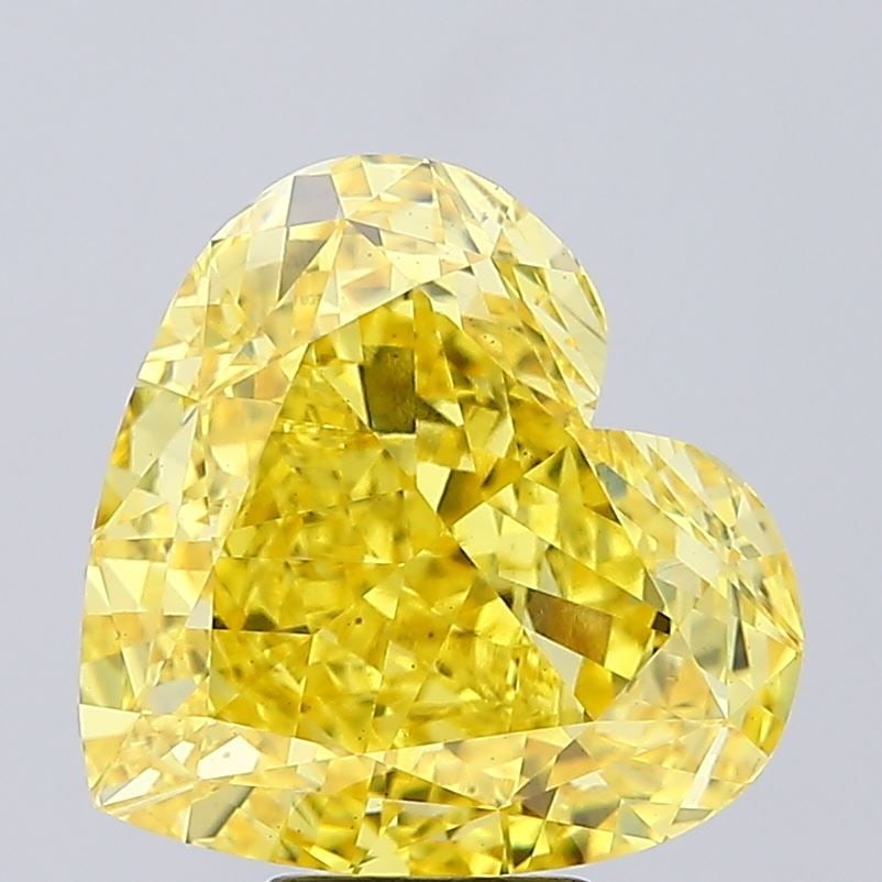 Loose Diamond - HEART 10.01ct Fancy Vivid Yellow VS1: Loose Diamond - HEART 10.01ct Fancy Vivid Yellow VS1 Source: This is a real non-mined Diamond that has been grown in a lab Shape: HEART Carats: 10.01 Color: Fancy Vivid Yellow Certification: IGI Video