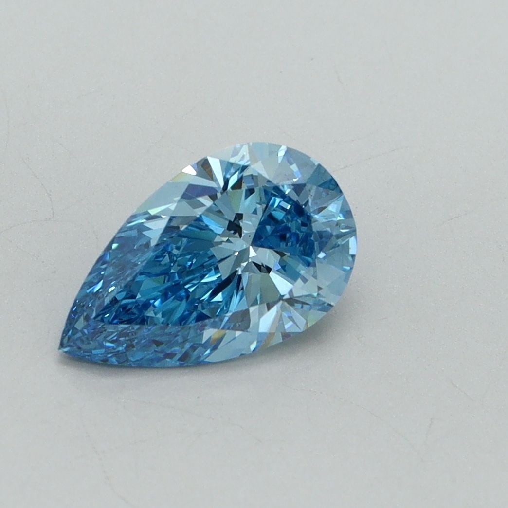 Loose Diamond - PEAR 1.06ct Fancy Vivid Blue VS2: Loose Diamond - PEAR 1.06ct Fancy Vivid Blue VS2 Source: This is a real non-mined Diamond that has been grown in a lab Shape: PEAR Carats: 1.06 Color: Fancy Vivid Blue Certification: IGI Video: