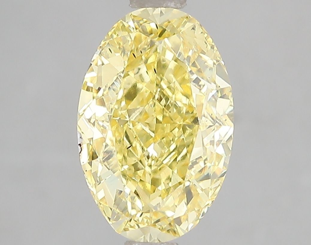 Loose Diamond - OVAL 3.01ct Fancy Vivid Yellow SI1: Loose Diamond - OVAL 3.01ct Fancy Vivid Yellow SI1 Source: This is a real non-mined Diamond that has been grown in a lab Shape: OVAL Carats: 3.01 Color: Fancy Vivid Yellow Certification: IGI Video: