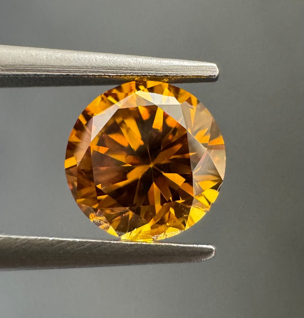 Loose Diamond - ROUND 0.61ct Fancy Deep Brownish Yellowish Orange I1: Loose Diamond - ROUND 0.61ct Fancy Deep Brownish Yellowish Orange I1 Source: Natural Shape: ROUND Carats: 0.61 Color: Fancy Deep Brownish Yellowish Orange Certification: GIA The Diamond Depot Guarante