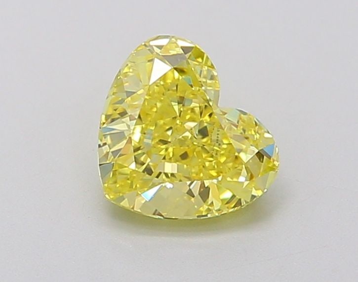 Loose Diamond - HEART 1.11ct Fancy Vivid Yellow VVS2: Loose Diamond - HEART 1.11ct Fancy Vivid Yellow VVS2 Source: This is a real non-mined Diamond that has been grown in a lab Shape: HEART Carats: 1.11 Color: Fancy Vivid Yellow Certification: IGI Video: