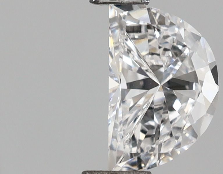 Loose Diamond - HALF MOON 0.32ct D VVS2: Loose Diamond - HALF MOON 0.32ct D VVS2 Source: This is a real non-mined Diamond that has been grown in a lab Shape: HALF MOON Carats: 0.32 Color: D Clarity: VVS2 Certification: IGI Video: