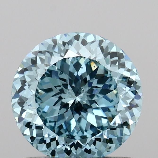 Loose Diamond - ROUND 1.04ct Fancy Vivid Blue VS2: Loose Diamond - ROUND 1.04ct Fancy Vivid Blue VS2 Source: This is a real non-mined Diamond that has been grown in a lab Shape: ROUND Carats: 1.04 Color: Fancy Vivid Blue Certification: IGI Video: