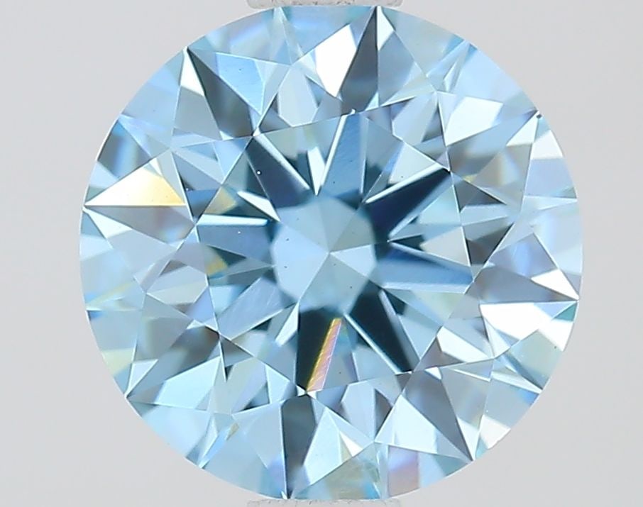 Ideal Loose Diamond - ROUND 1.29ct Fancy Vivid Blue VS1: Ideal Loose Diamond - ROUND 1.29ct Fancy Vivid Blue VS1 Source: This is a real non-mined Diamond that has been grown in a lab Shape: ROUND Carats: 1.29 Color: Fancy Vivid Blue Certification: IGI Video