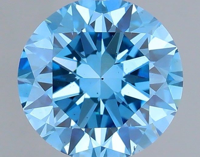 Loose Diamond - ROUND 0.7ct Fancy Vivid Blue VS2: Loose Diamond - ROUND 0.7ct Fancy Vivid Blue VS2 Source: This is a real non-mined Diamond that has been grown in a lab Shape: ROUND Carats: 0.7 Color: Fancy Vivid Blue Certification: IGI Video: