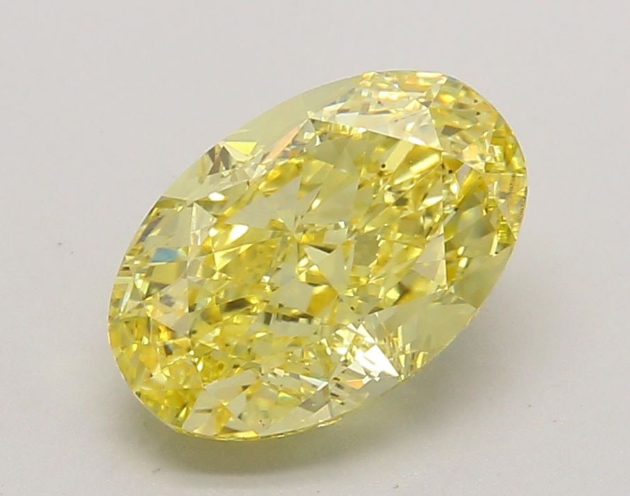 Loose Diamond - OVAL 2.63ct Fancy Intense Yellow VS2: Loose Diamond - OVAL 2.63ct Fancy Intense Yellow VS2 Source: This is a real non-mined Diamond that has been grown in a lab Shape: OVAL Carats: 2.63 Color: Fancy Intense Yellow Certification: IGI Video
