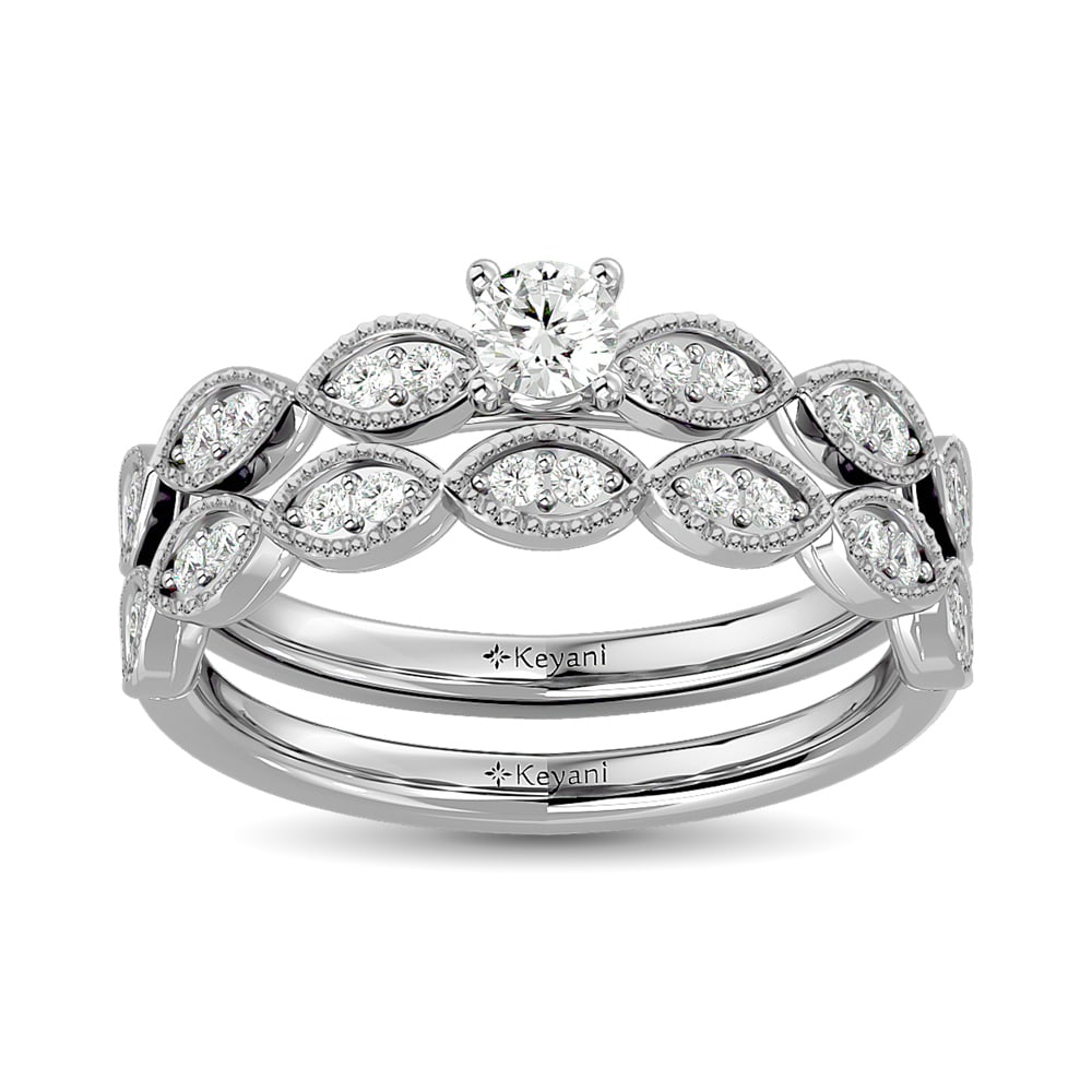 Diamond 1 Ct.Tw. Bridal Ring in 14K White Gold: Diamond 1 Ct.Tw. Bridal Ring in 14K White Gold 14k White Gold Stone Color: G-h Stone Clarity: Si2 Each ring is presented in standard size 6.5. Complimentary resizing is available between sizes 510 (in