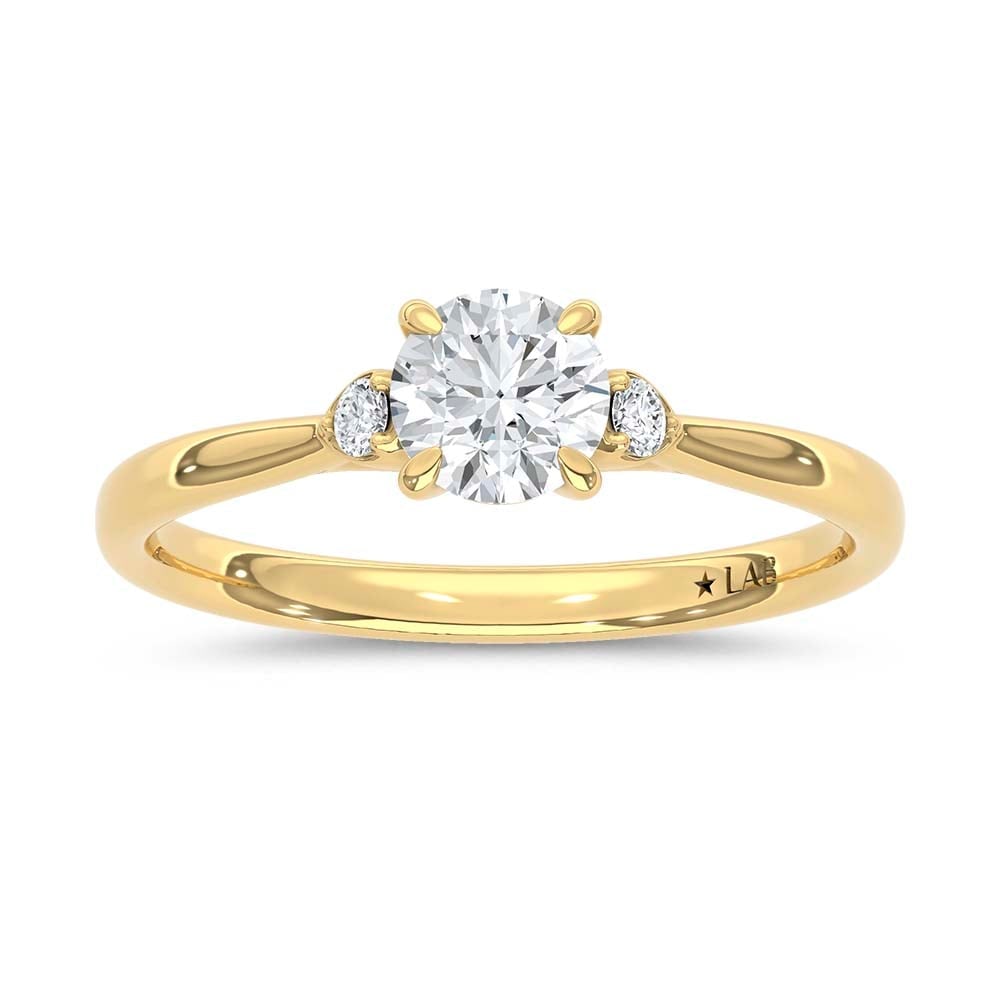 10K Yellow Gold Lab Grown Diamond 1/2 Ct.Tw. Promise Ring: 10K Yellow Gold Lab Grown Diamond 1/2 Ct.Tw. Promise Ring Celebrate love, commitment, and meaningful moments with this elegant lab-grown diamond promise ring, crafted in radiant 10K Yellow gold. Featu