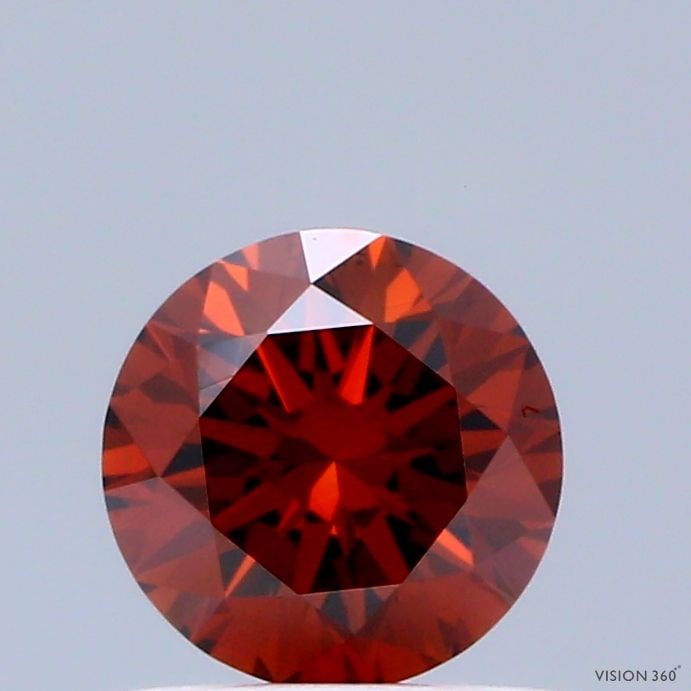 Loose Diamond - ROUND 0.63ct Fancy Deep Orange VS2: Loose Diamond - ROUND 0.63ct Fancy Deep Orange VS2 Source: This is a real non-mined Diamond that has been grown in a lab Shape: ROUND Carats: 0.63 Color: Fancy Deep Orange Certification: IGI Video: