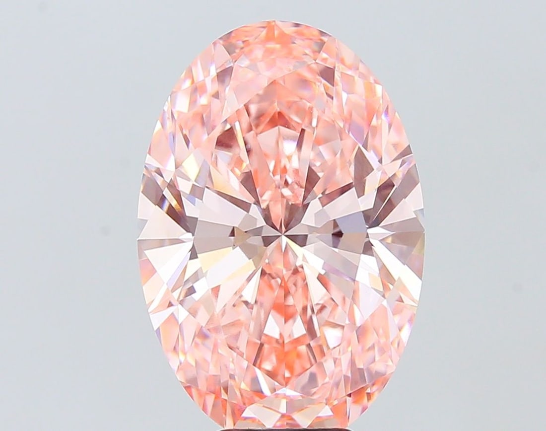 Loose Diamond - OVAL 8.05ct Fancy Vivid Pink VVS2: Loose Diamond - OVAL 8.05ct Fancy Vivid Pink VVS2 Source: This is a real non-mined Diamond that has been grown in a lab Shape: OVAL Carats: 8.05 Color: Fancy Vivid Pink Certification: IGI Video: